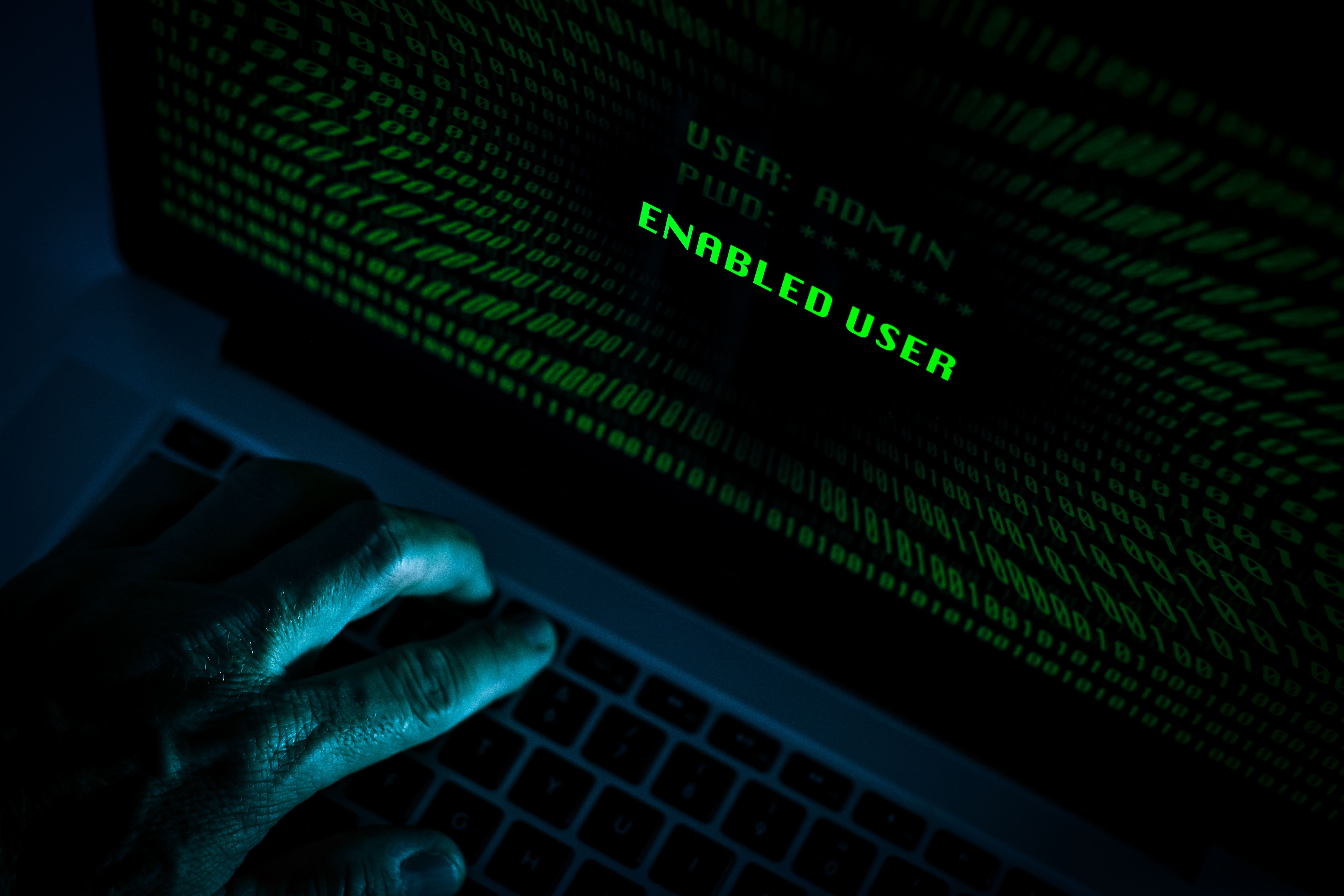 hand-typing-laptop-keyboard-green-numbers-display-successful-login-with-credentials-password