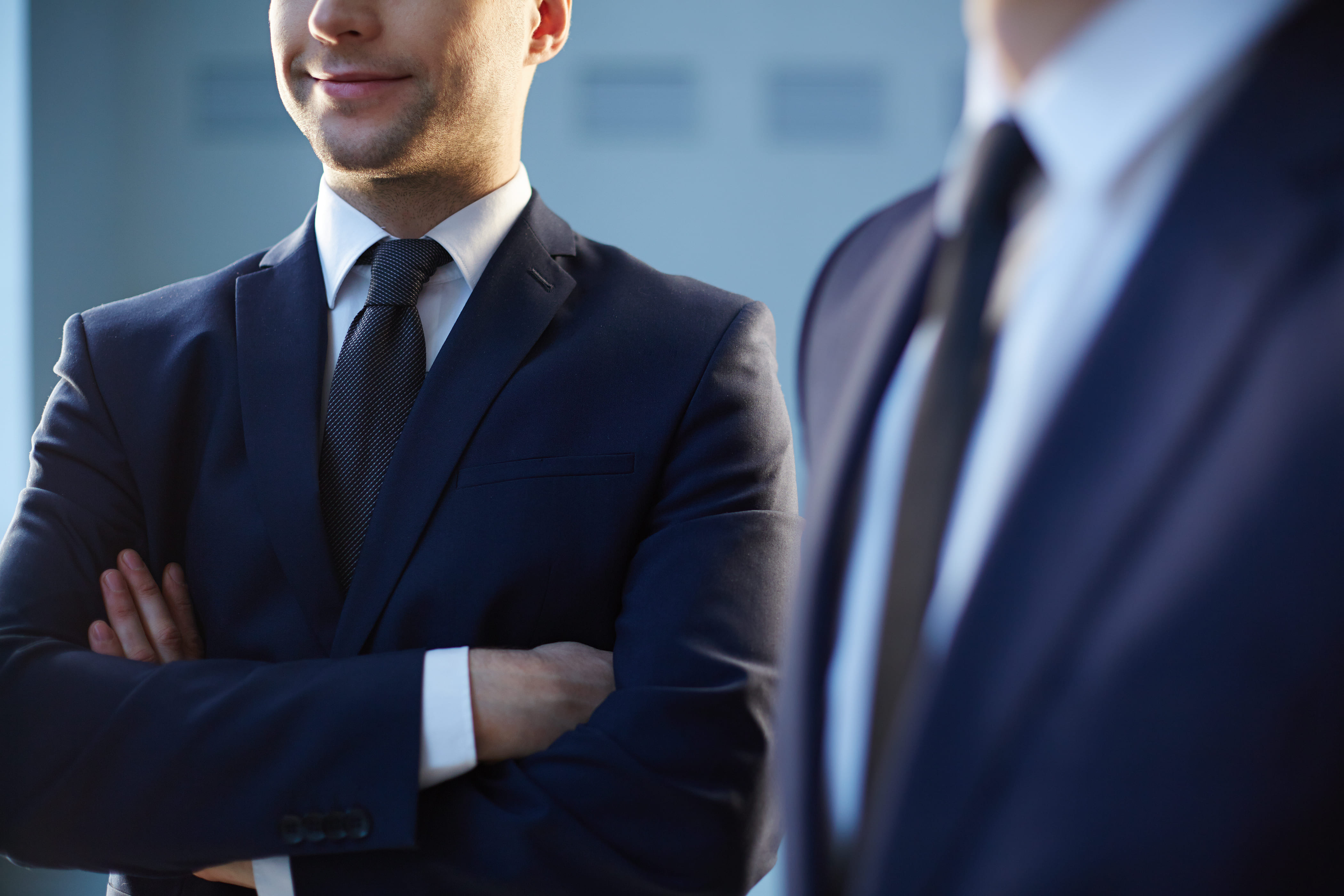 close-up-employee-with-crossed-arms