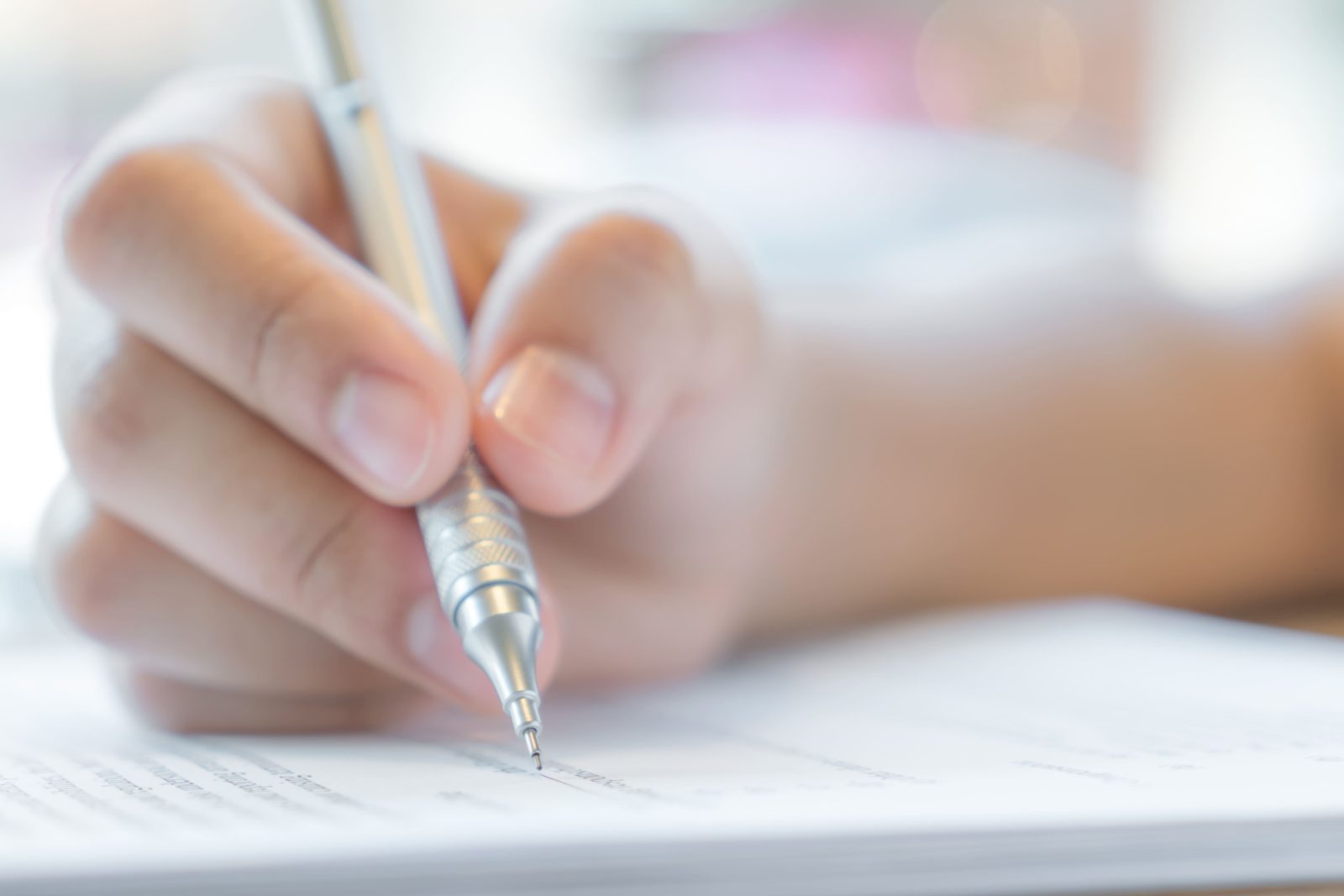 hand-with-pen-application-form 2