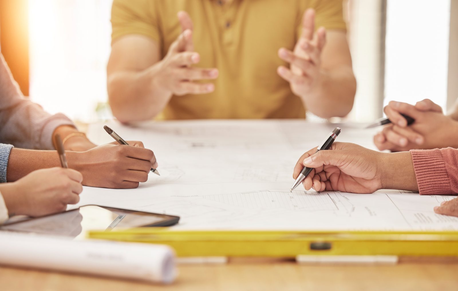 engineering-architecture-hands-people-with-blueprint-planning-discussion-building-design-teamwork-construction-men-women-meeting-with-illustration-floor-plan-paper