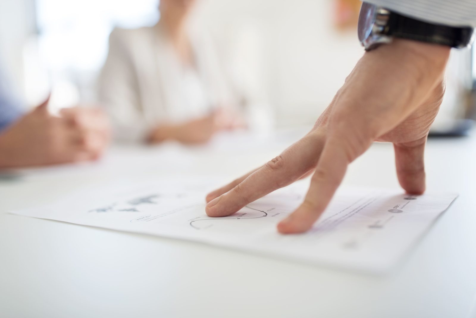 close-up-businessman-with-charts-office